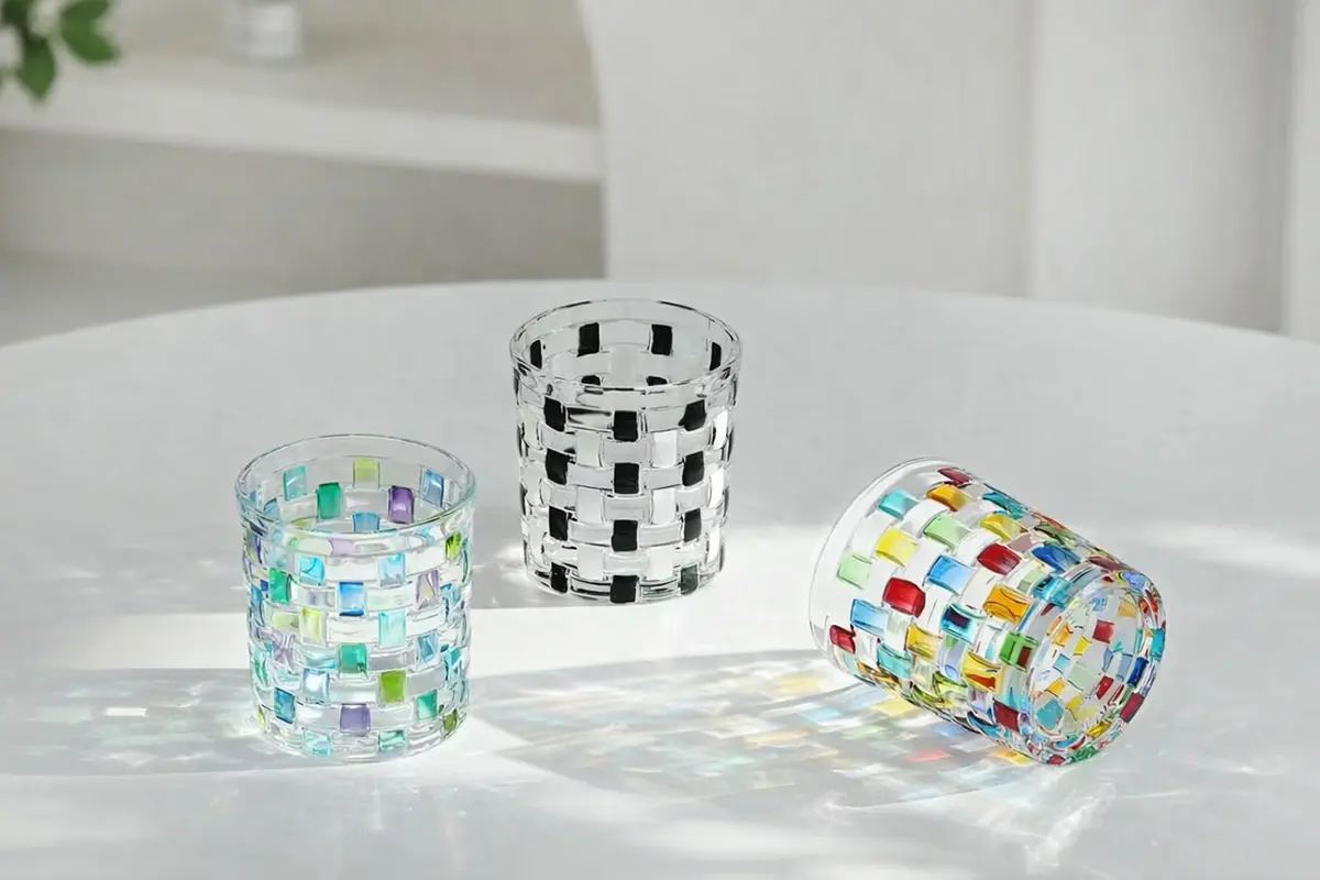 Juice and water glasses in colorful tumbler styles for everyday drink service