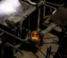 Workers hand blowing glass in the production workshop