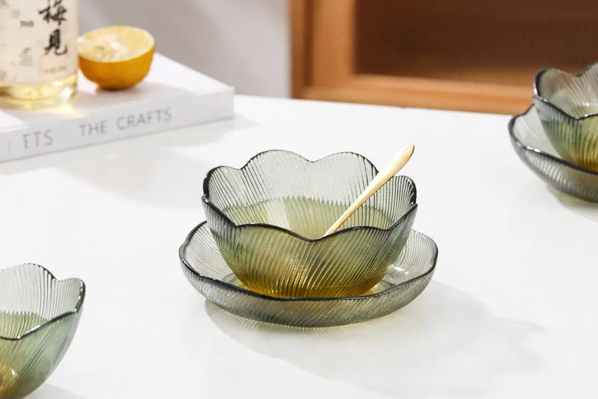 Green glass bowl with matching saucer for salad, dessert, and table service