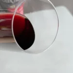 Close-up of Bordeaux red wine glass rim with red wine