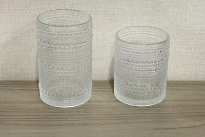 Same shape glass cups in two different capacities for custom size options