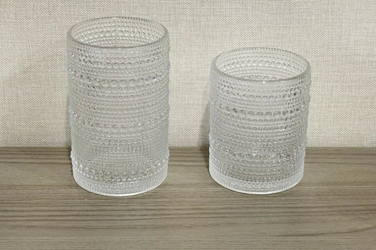 Same shape glass cups in two different capacities for custom size options