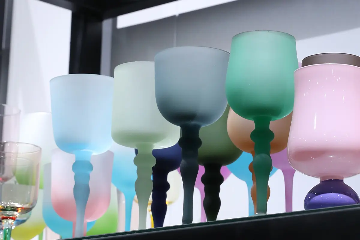 Colored frosted glassware showing coating and decorative surface treatment options